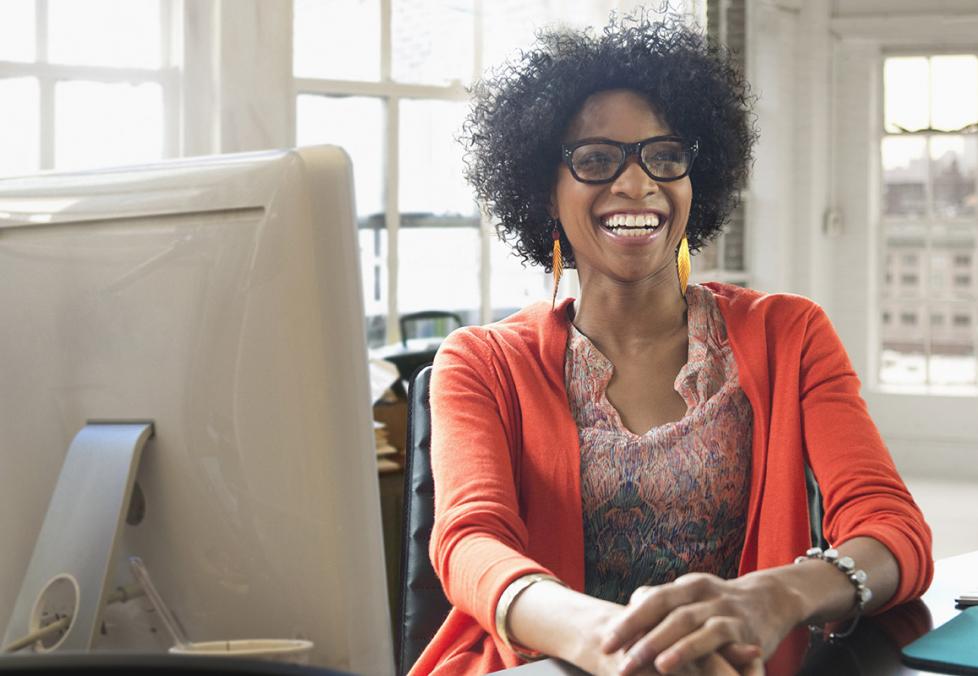 Woman with glasses smiling