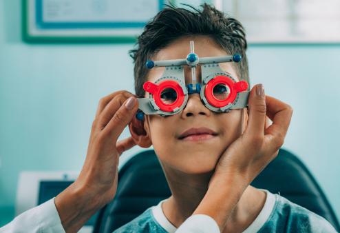 Boy getting eye exam