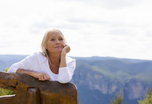 Older woman looking at mountain view