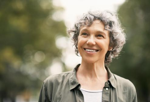 Your America's Best eye doctor is a great resource to help you figure out if laser eye surgery is right for you. Woman on a walk.