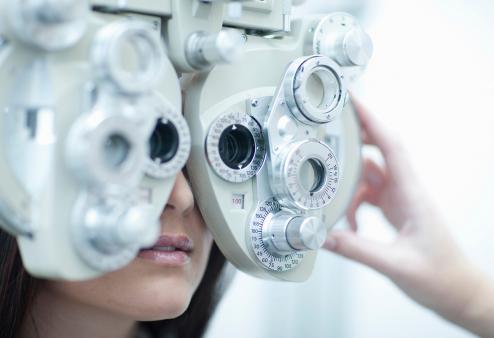 Young women having eye test