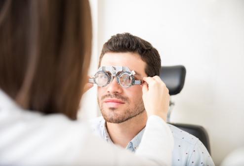 man getting eye exam