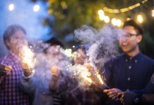 friends playing with fireworks